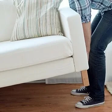 BeforeLaminateInstall Moving sofa | Derailed Commodity Flooring & Furniture